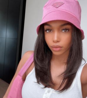 lori harvey in a bucket hat. Lori harvey and michael b jordan relationship. Bucket hats are a trend that became relevant among Hip Hop superstar LL Cool J. Cool J popularized the Kangol bucket hat to become a cool and stylish way to accessorize your swaggy outfits. Towards the end of the year, the main character in the hit Netflix show, “Emily in Paris," wore a bucket hat in one of the episodes and ever since then, fashion enthusiasts have been rocking the 80s trend. 